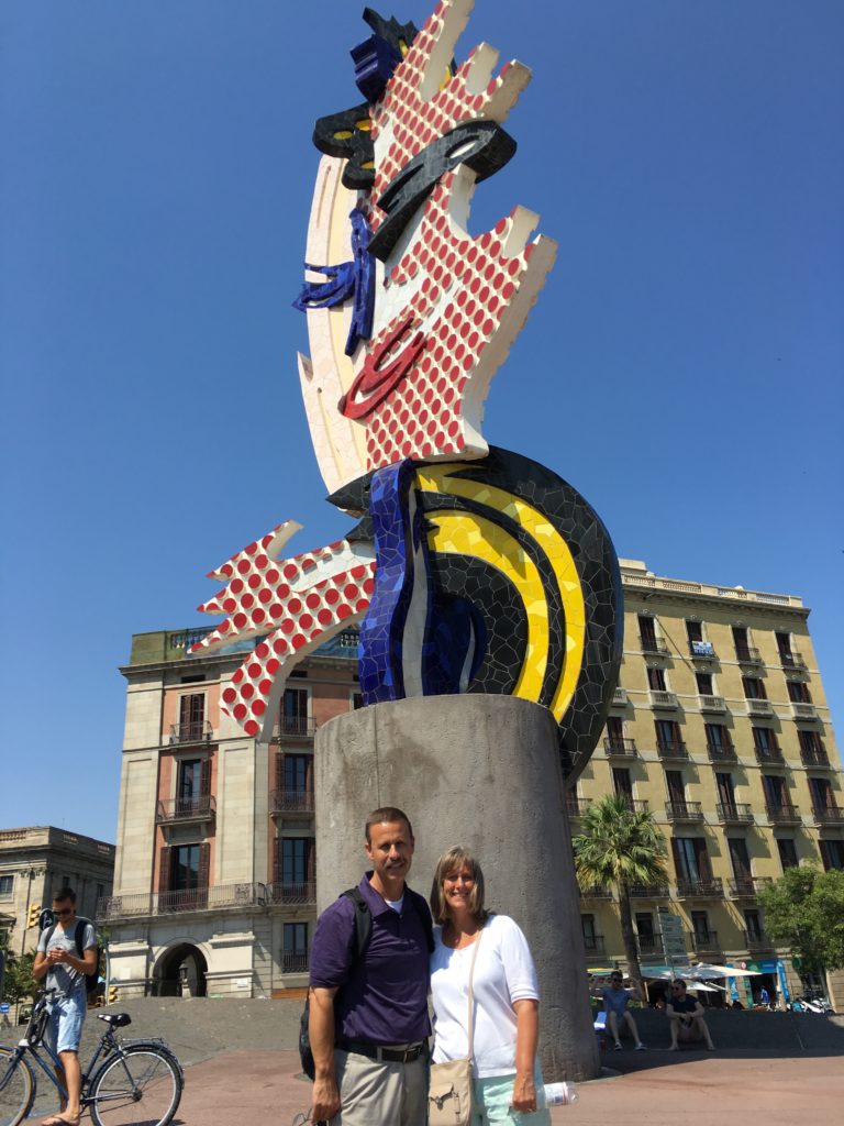 The Barcelona’s Head sculpture (also known as Barcelona’s Face) was designed by American Pop Artist Roy Lichtenstein for the 1992 Olympic Games. The striking 90 ton statue is covered with brightly coloured mosaic tiles, a clear tribute to the works of Antoni Gaudi. The design also shows a strong Picasso influence mixed with the comic book style that Lichtenstein was famous for.